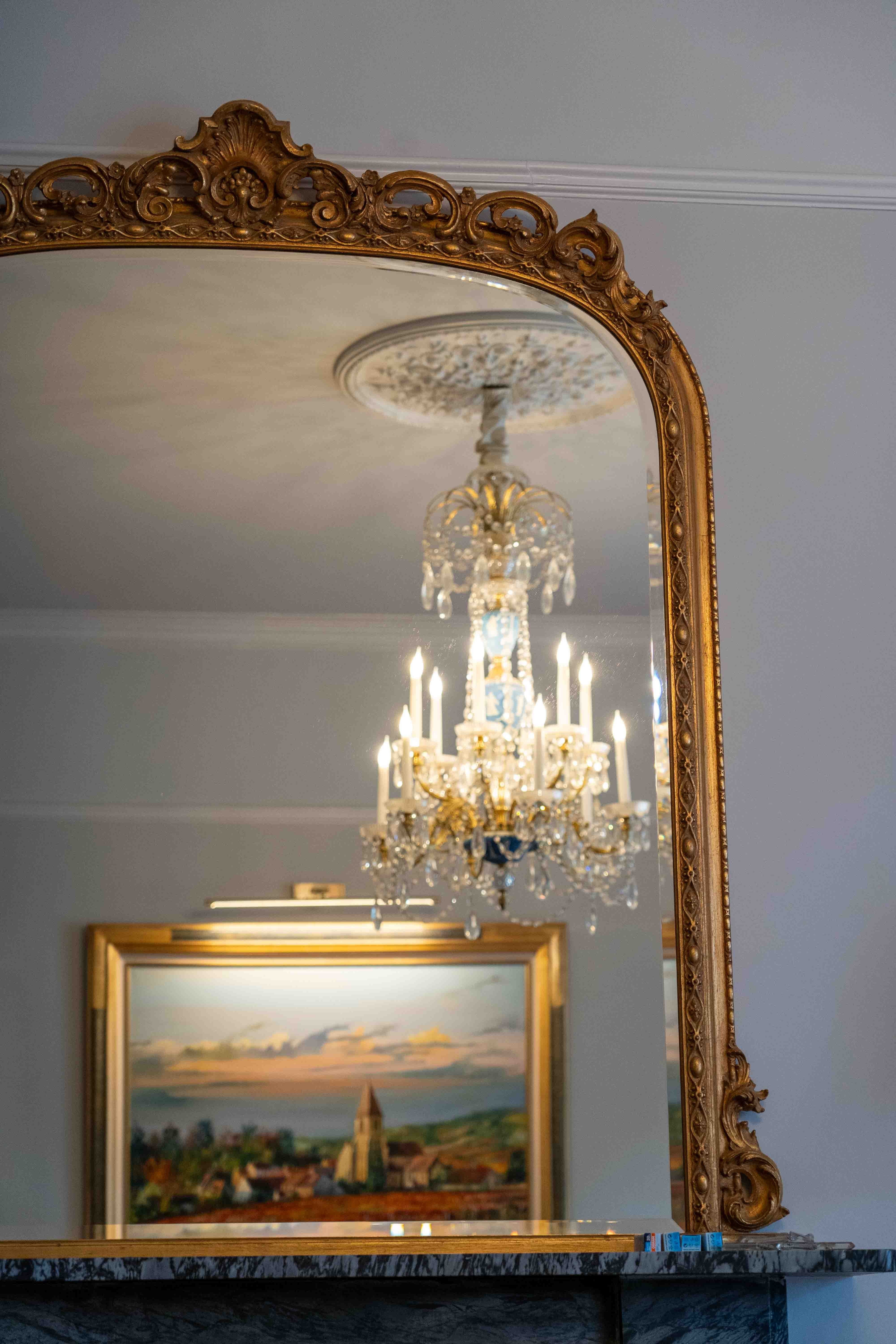 A Victorian style giltwood and composition overmantel mirror, width 140cm, height 164cm. Condition - good